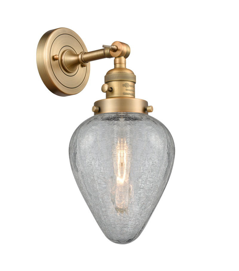 Innovations Lighting Geneseo 1-100 watt 6.5 inch Brushed Brass Sconce with Clear Crackle glass and Solid Brass 180 Degree Adjustable Swivel With Engraved Cast Cup Includes a "High-Low-Off" Switch. 203SWBBG165