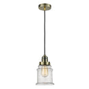 Canton Mini Pendant shown in the Antique Brass finish with a Seedy shade