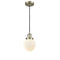 Beacon Mini Pendant shown in the Antique Brass finish with a Matte White shade