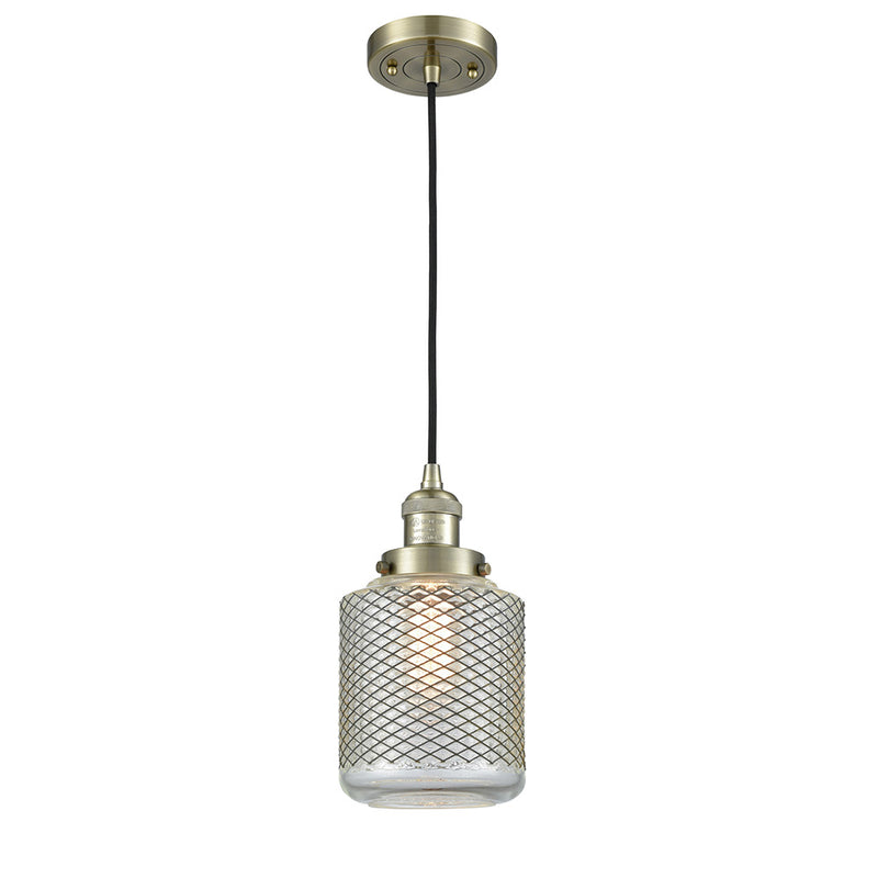 Stanton Mini Pendant shown in the Antique Brass finish with a Clear Wire Mesh shade