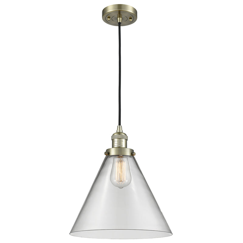 Cone Mini Pendant shown in the Antique Brass finish with a Clear shade