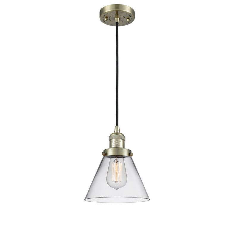 Cone Mini Pendant shown in the Antique Brass finish with a Clear shade