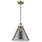 Cone Mini Pendant shown in the Antique Brass finish with a Plated Smoke shade