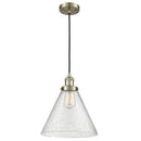 Cone Mini Pendant shown in the Antique Brass finish with a Seedy shade