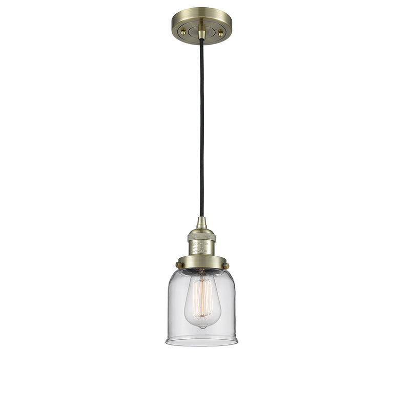 Bell Mini Pendant shown in the Antique Brass finish with a Clear shade