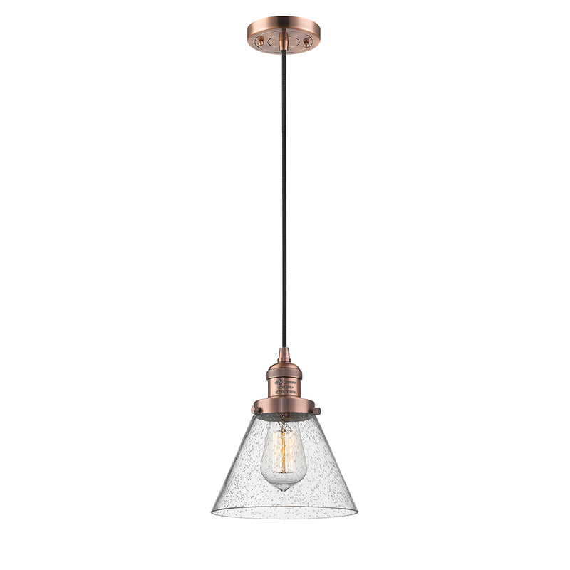 Cone Mini Pendant shown in the Antique Copper finish with a Seedy shade