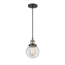 Beacon Mini Pendant shown in the Black Antique Brass finish with a Clear shade