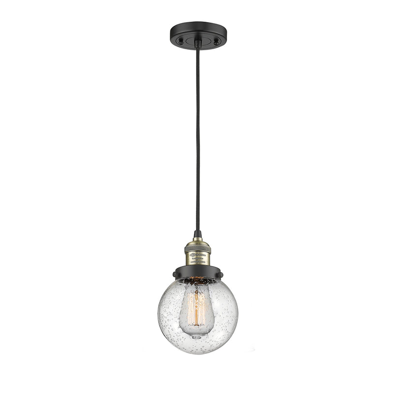 Beacon Mini Pendant shown in the Black Antique Brass finish with a Seedy shade