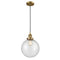 Beacon Mini Pendant shown in the Brushed Brass finish with a Seedy shade