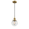 Beacon Mini Pendant shown in the Brushed Brass finish with a Seedy shade