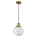 Beacon Mini Pendant shown in the Brushed Brass finish with a Seedy shade