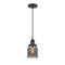 Bell Mini Pendant shown in the Matte Black finish with a Plated Smoke shade