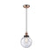 Beacon Mini Pendant shown in the Antique Copper finish with a Seedy shade