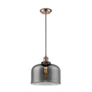 Bell Mini Pendant shown in the Antique Copper finish with a Plated Smoke shade