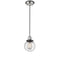 Beacon Mini Pendant shown in the Polished Nickel finish with a Seedy shade