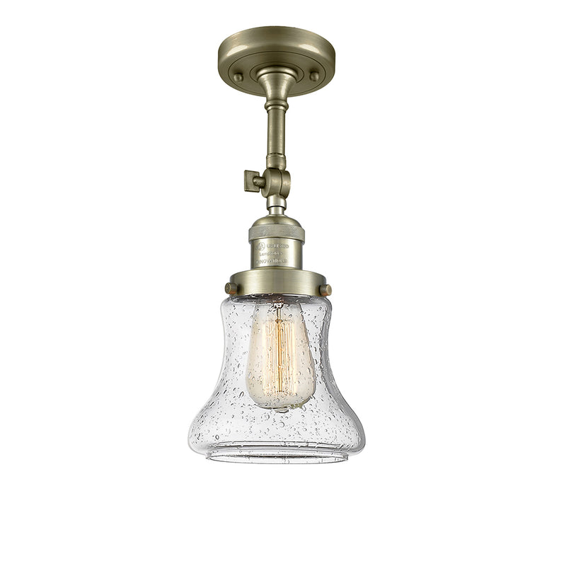 Bellmont Semi-Flush Mount shown in the Antique Brass finish with a Seedy shade