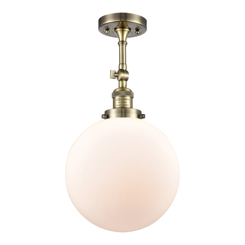 Beacon Semi-Flush Mount shown in the Antique Brass finish with a Matte White shade