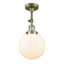 Beacon Semi-Flush Mount shown in the Antique Brass finish with a Matte White shade