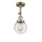 Beacon Semi-Flush Mount shown in the Antique Brass finish with a Seedy shade