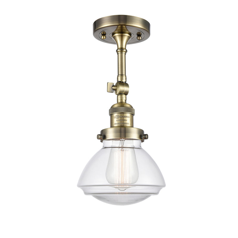 Olean Semi-Flush Mount shown in the Antique Brass finish with a Clear shade