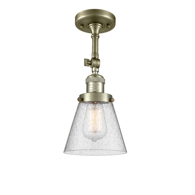 Cone Semi-Flush Mount shown in the Antique Brass finish with a Seedy shade