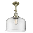 Bell Semi-Flush Mount shown in the Antique Brass finish with a Clear shade