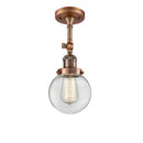 Beacon Semi-Flush Mount shown in the Antique Copper finish with a Clear shade