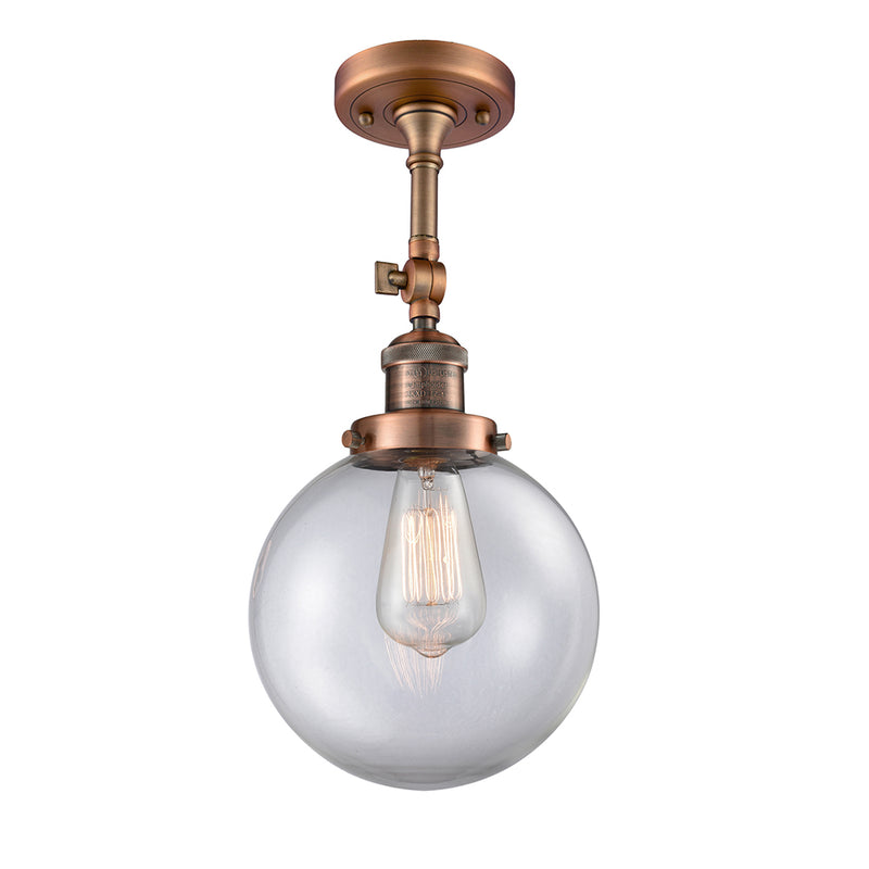 Beacon Semi-Flush Mount shown in the Antique Copper finish with a Clear shade