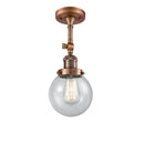 Beacon Semi-Flush Mount shown in the Antique Copper finish with a Seedy shade