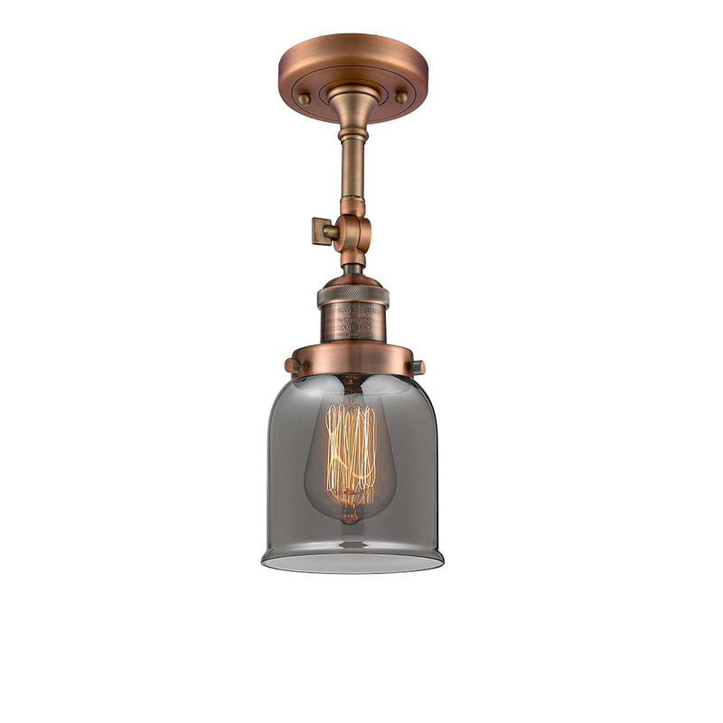 Bell Semi-Flush Mount shown in the Antique Copper finish with a Plated Smoke shade