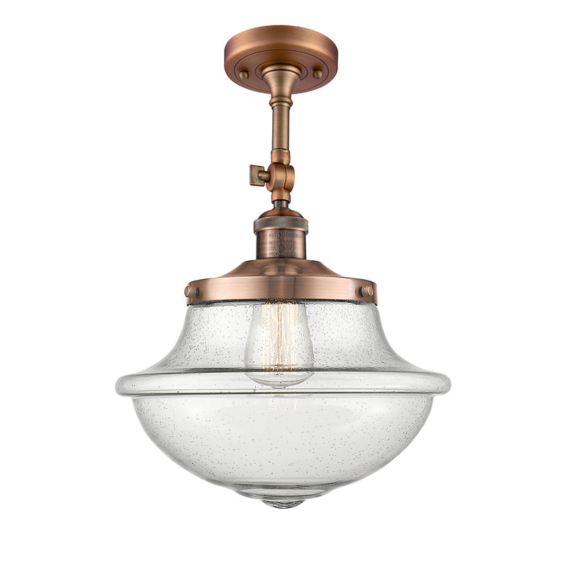 Oxford Semi-Flush Mount shown in the Antique Copper finish with a Seedy shade