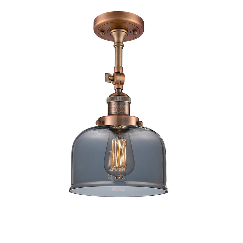 Bell Semi-Flush Mount shown in the Antique Copper finish with a Plated Smoke shade