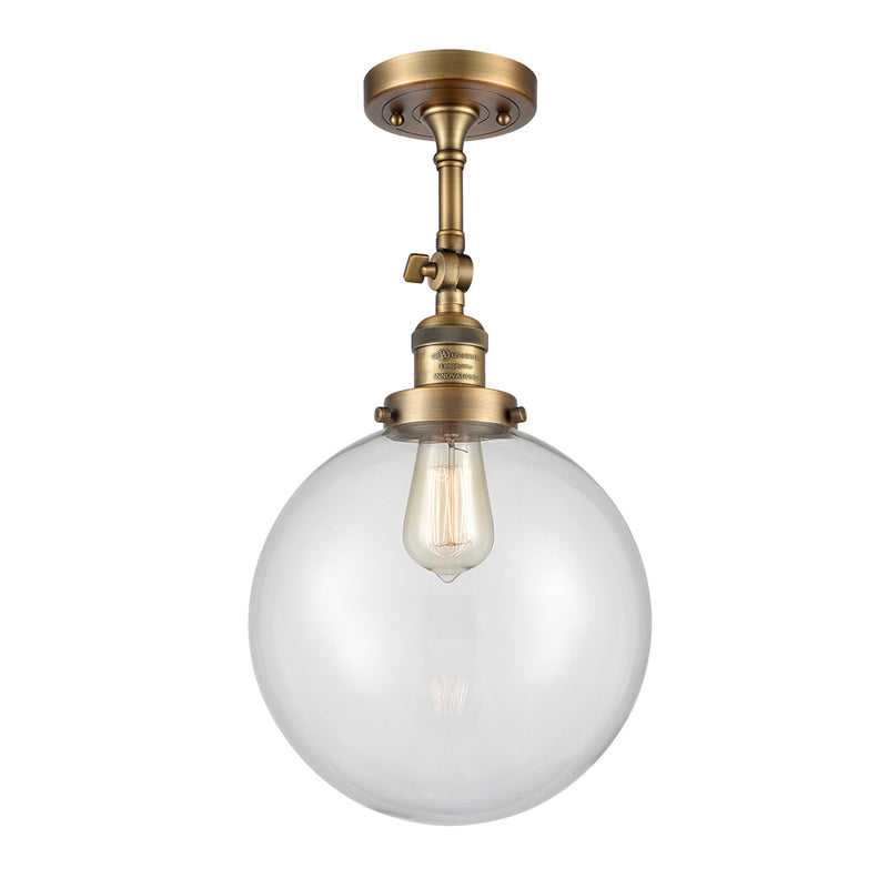 Beacon Semi-Flush Mount shown in the Brushed Brass finish with a Clear shade