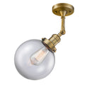 Beacon Semi-Flush Mount shown in the Brushed Brass finish with a Clear shade