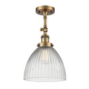 Seneca Falls Semi-Flush Mount shown in the Brushed Brass finish with a Clear Halophane shade