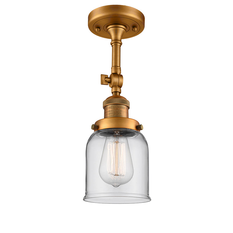 Bell Semi-Flush Mount shown in the Brushed Brass finish with a Clear shade