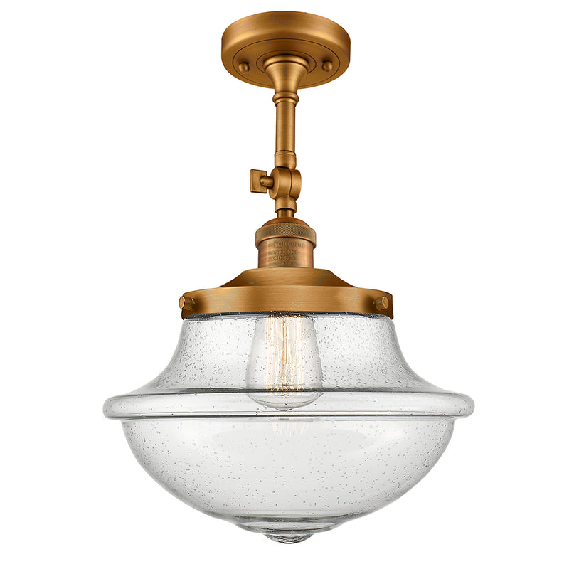 Oxford Semi-Flush Mount shown in the Brushed Brass finish with a Seedy shade