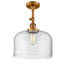 Bell Semi-Flush Mount shown in the Brushed Brass finish with a Clear shade