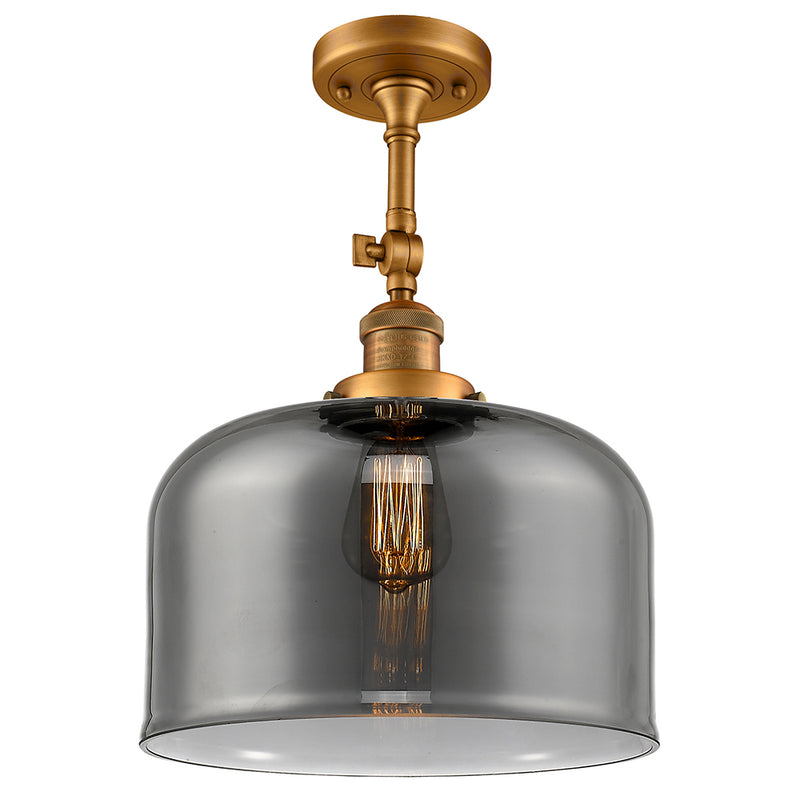 Bell Semi-Flush Mount shown in the Brushed Brass finish with a Plated Smoke shade