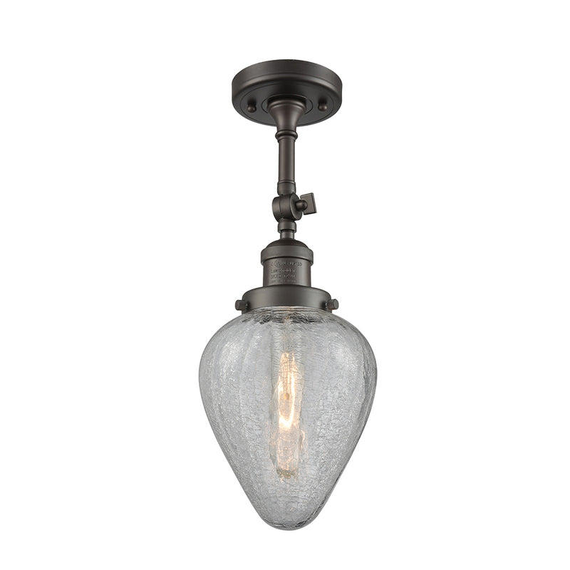 Geneseo Semi-Flush Mount shown in the Oil Rubbed Bronze finish with a Clear Crackled shade