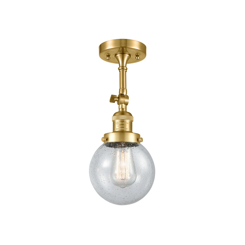 Beacon Semi-Flush Mount shown in the Satin Gold finish with a Seedy shade