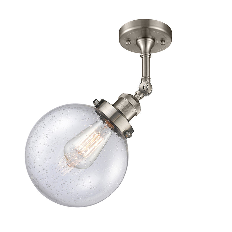 Beacon Semi-Flush Mount shown in the Brushed Satin Nickel finish with a Seedy shade