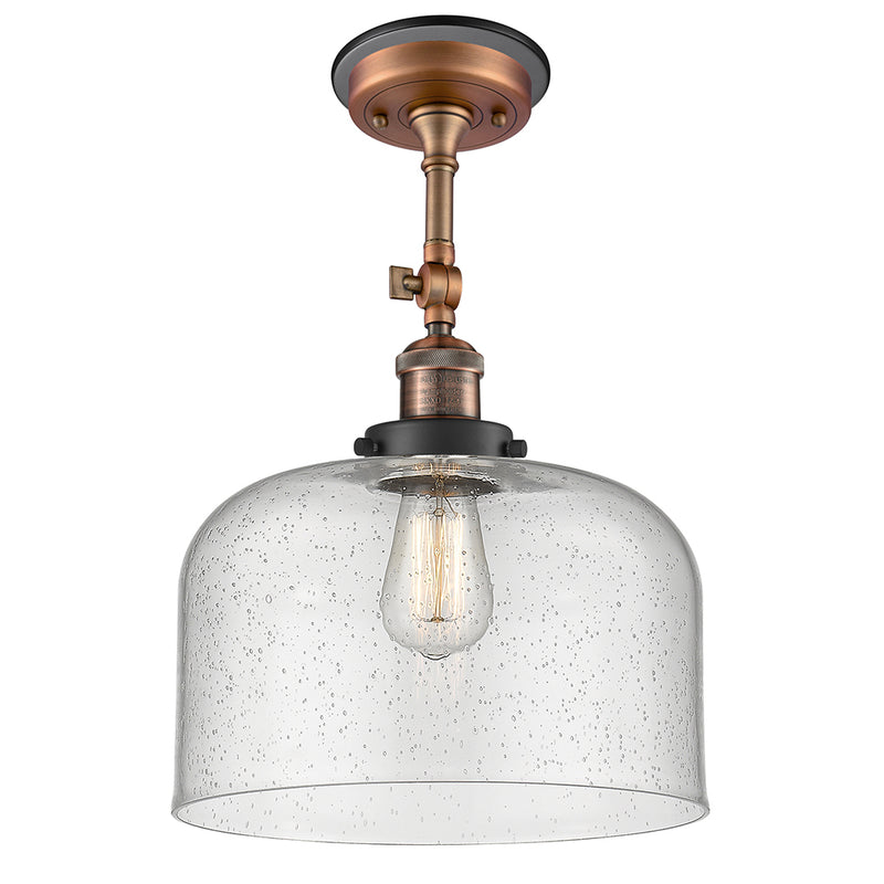 Bell Semi-Flush Mount shown in the Antique Copper finish with a Seedy shade