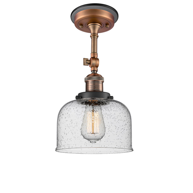 Bell Semi-Flush Mount shown in the Antique Copper finish with a Seedy shade