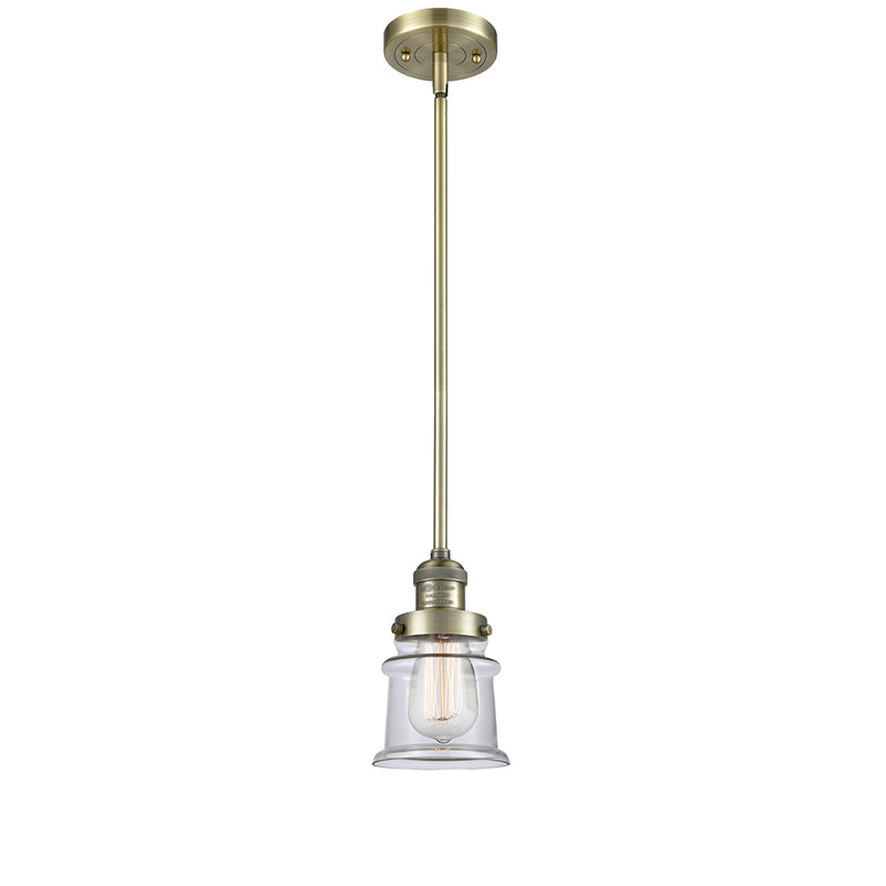 Canton Mini Pendant shown in the Antique Brass finish with a Clear shade