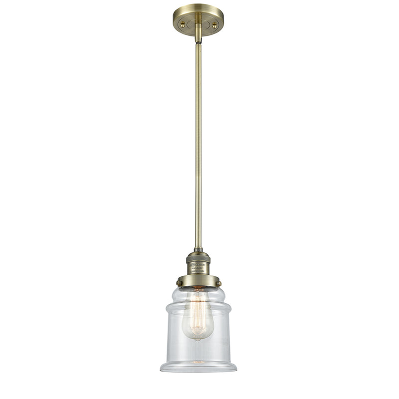 Canton Mini Pendant shown in the Antique Brass finish with a Clear shade