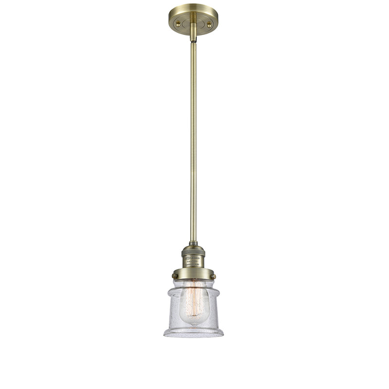 Canton Mini Pendant shown in the Antique Brass finish with a Seedy shade