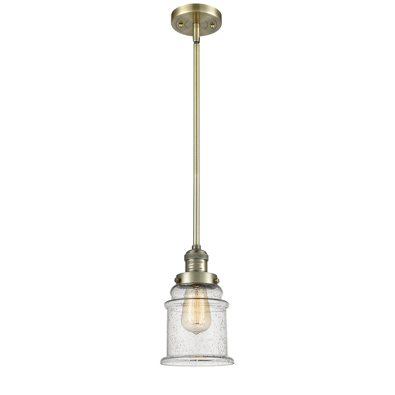 Canton Mini Pendant shown in the Antique Brass finish with a Seedy shade