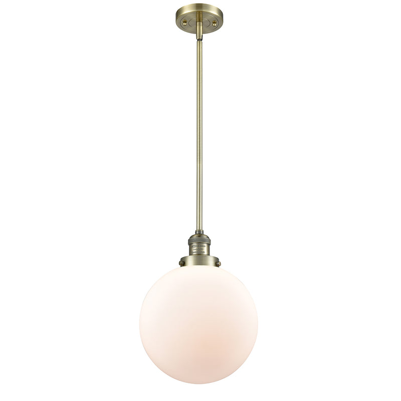 Beacon Mini Pendant shown in the Antique Brass finish with a Matte White shade