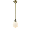 Beacon Mini Pendant shown in the Antique Brass finish with a Matte White shade